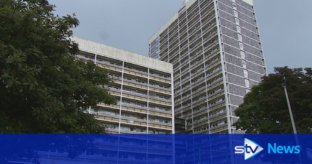 Woman charged with murder after man's body found in high rise flat in ...
