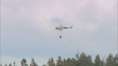 Firefighters continue to battle wildfire in the Highlands