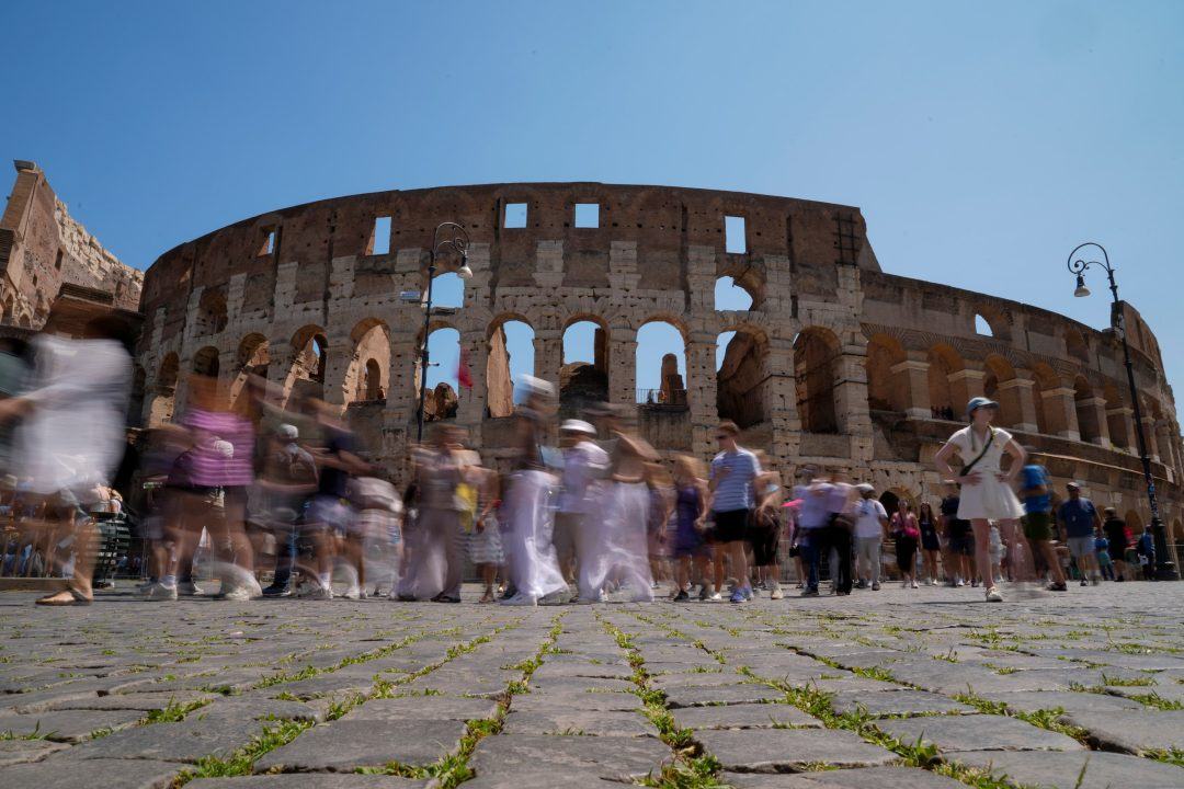 Man filmed carving name on Rome’s Colosseum tourist living in UK, Italy police say