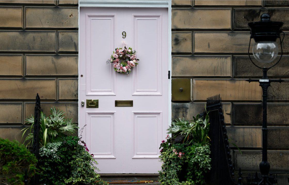 Pink door woman finally wins paint colour approval following battle with Edinburgh City Council