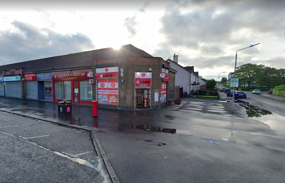 Armed robber wearing wig tackled by customers during Glasgow Post Office raid