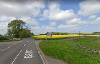 Crash with lorry on B9113 at Pitkennedy leaves motorcyclist fighting for life in hospital
