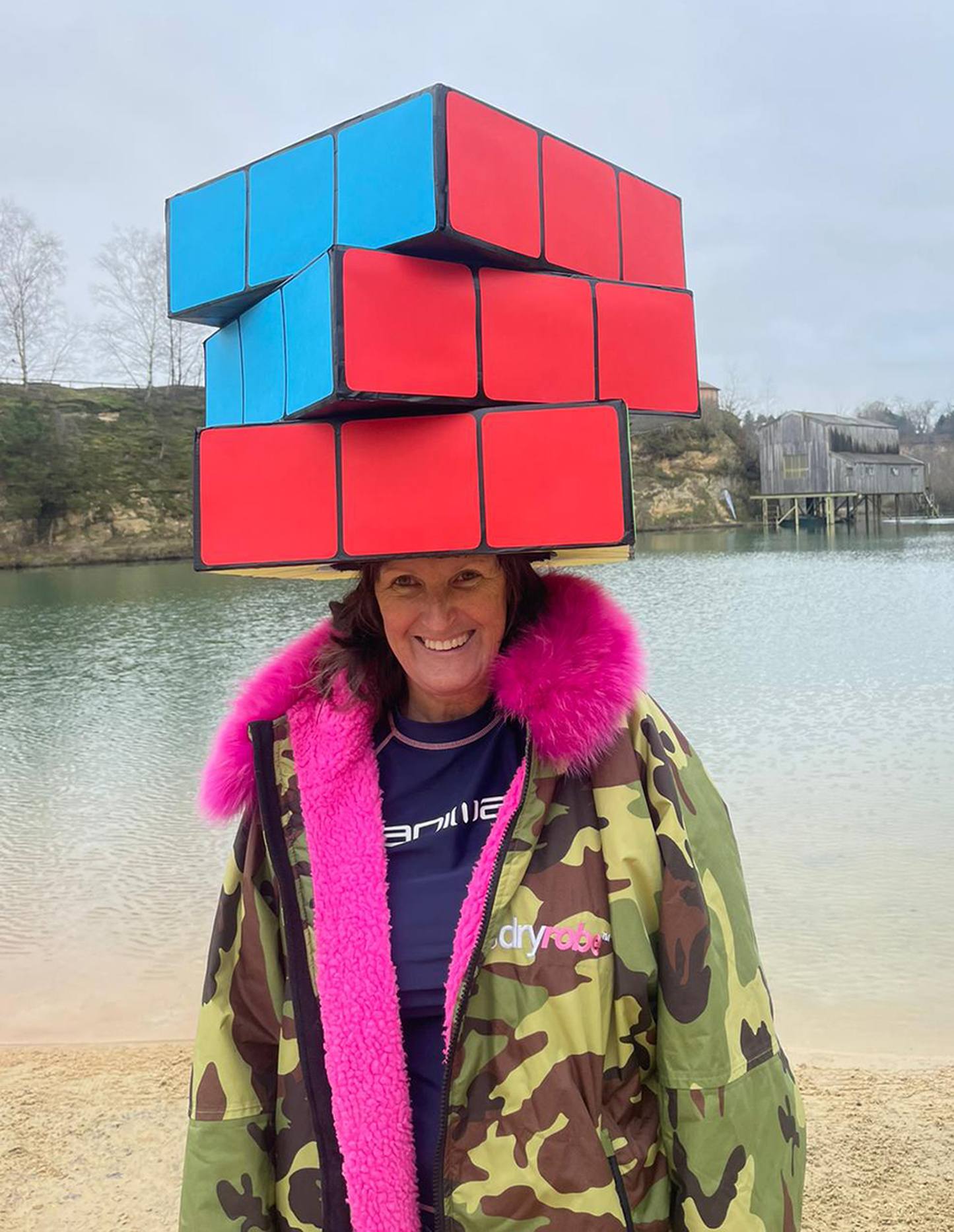 Jule Harris, wearing her Rubik Cube hat, who was chosen as a finalist in the creative fundraiser of the year category for the 2023 GoCardless JustGiving Awards