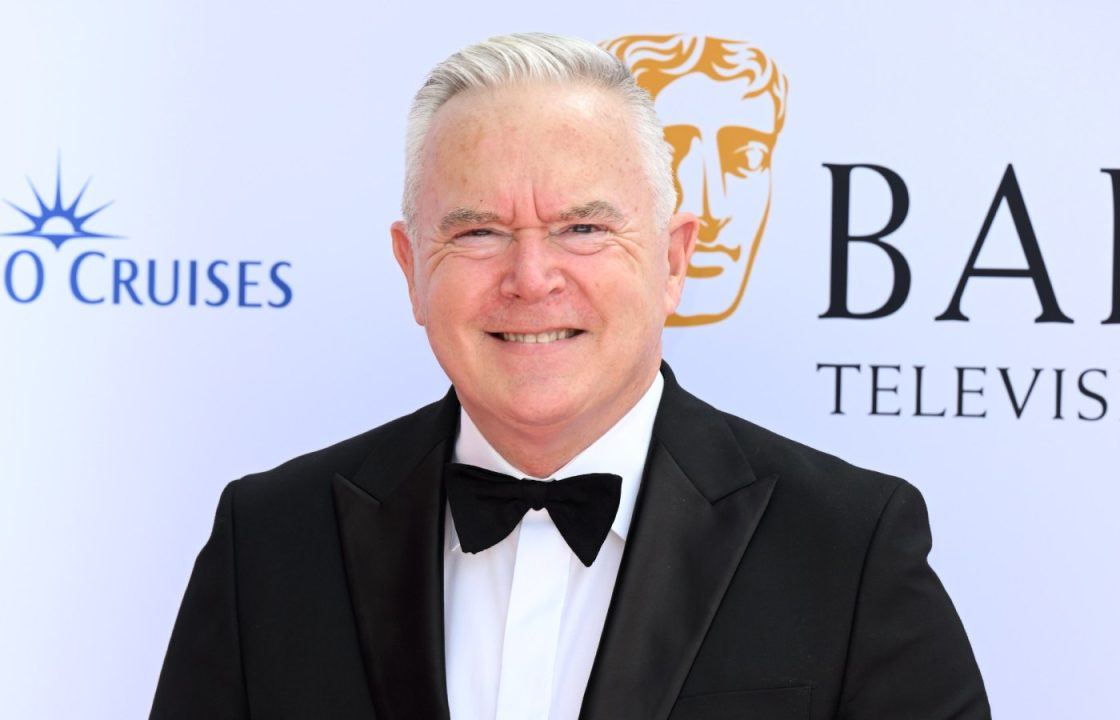 Huw Edwards named by wife as BBC presenter facing explicit photo allegations