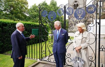King opens Jubilee Gates installed to honour late Queen