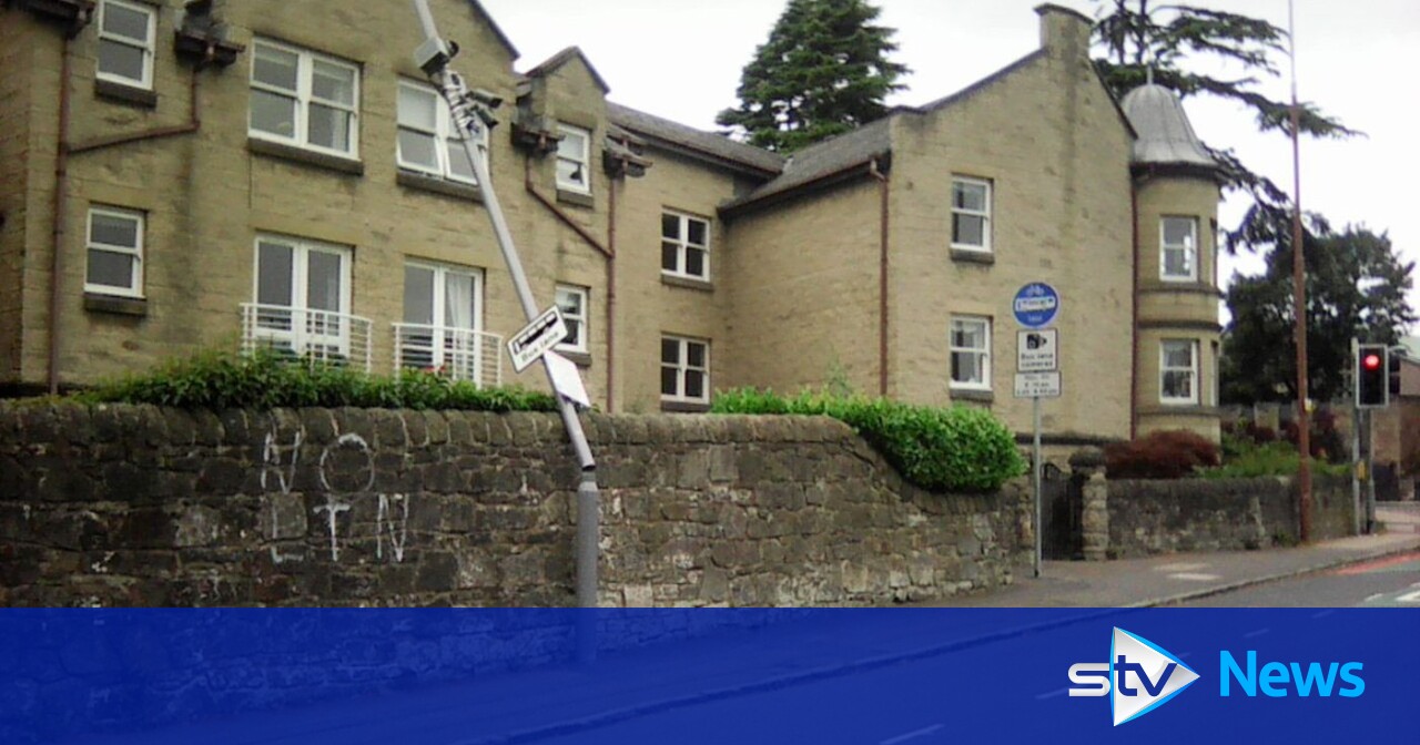 Pole with controversial Manse Road bus lane camera at busy junction