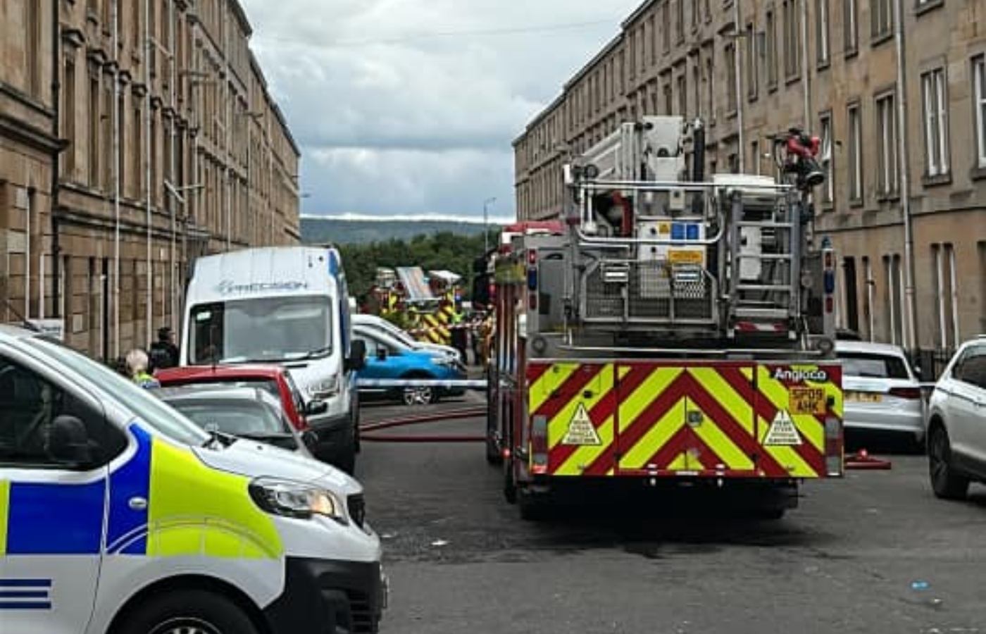 Four people in hospital after fire rips through Glasgow tenement block