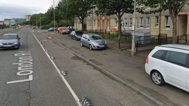 Two men threatened with hammer during attempted robbery on London Road, Glasgow