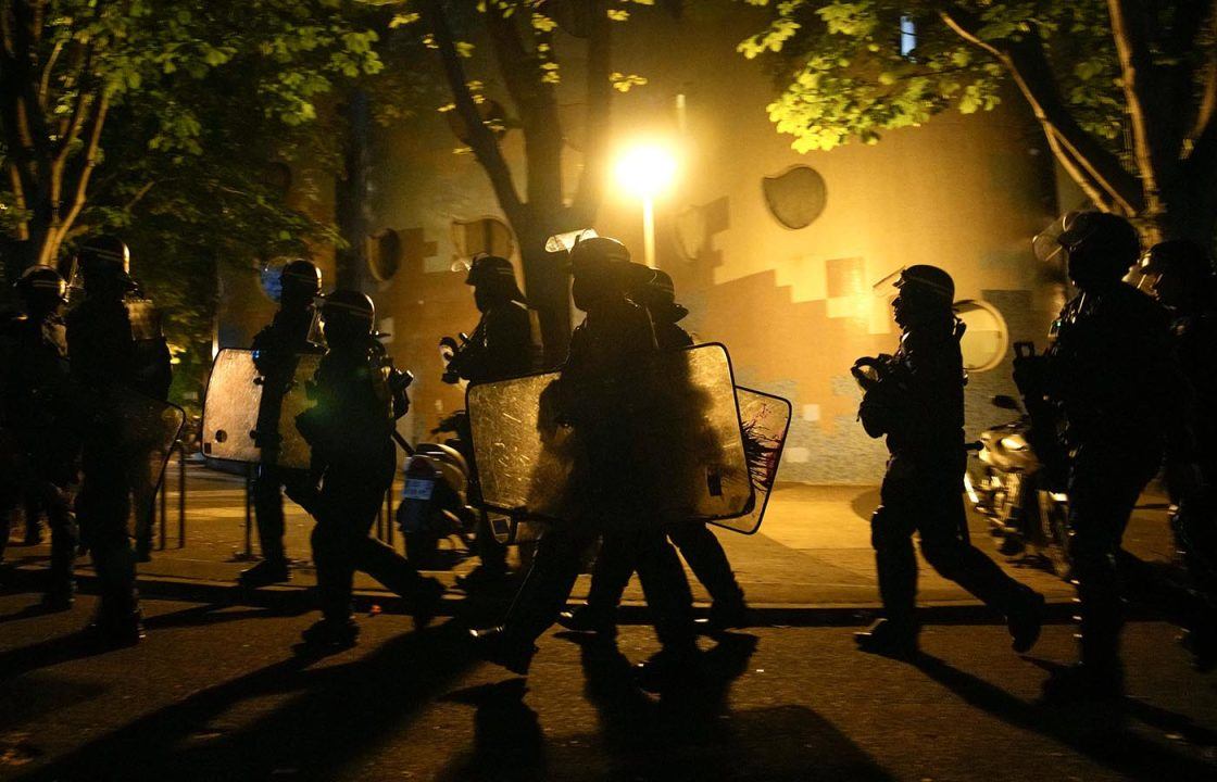 More than 900 arrested overnight as rioters clash with police around France