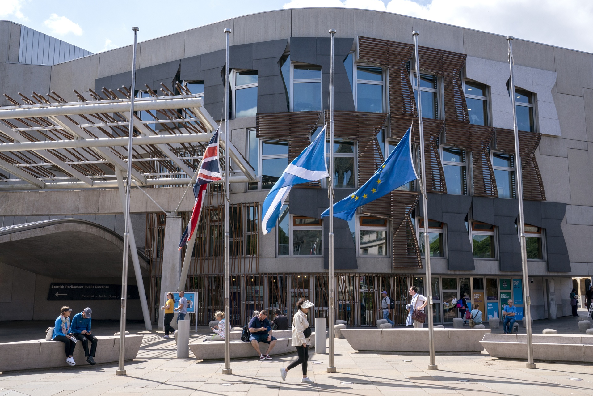 Flags flew at half-mast outside the Scottish Parliament in Holyrood, Edinburgh, following Winnie Ewing’s death.