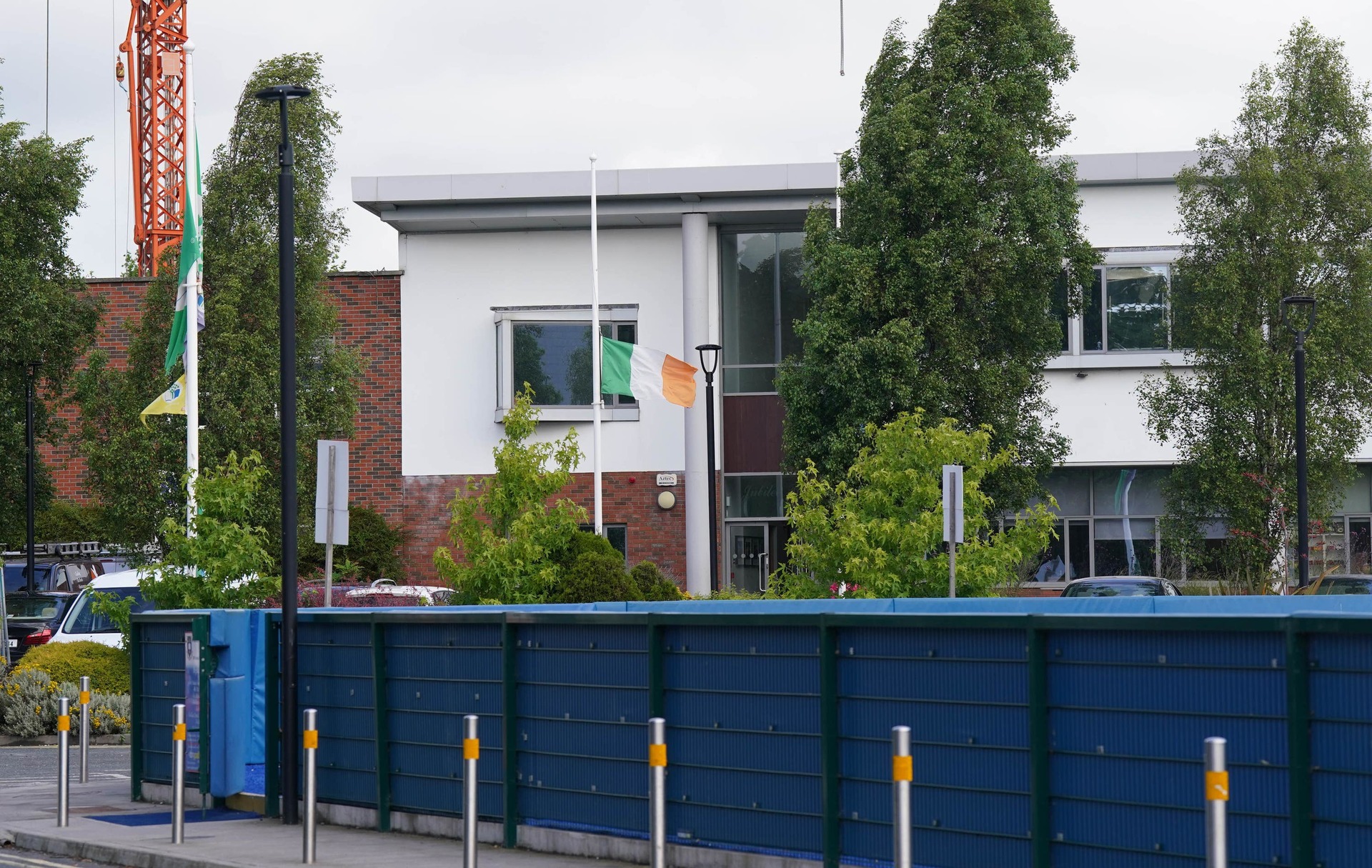 The Irish tricolour and the school flag being flown at half mast at St Michael’s College.