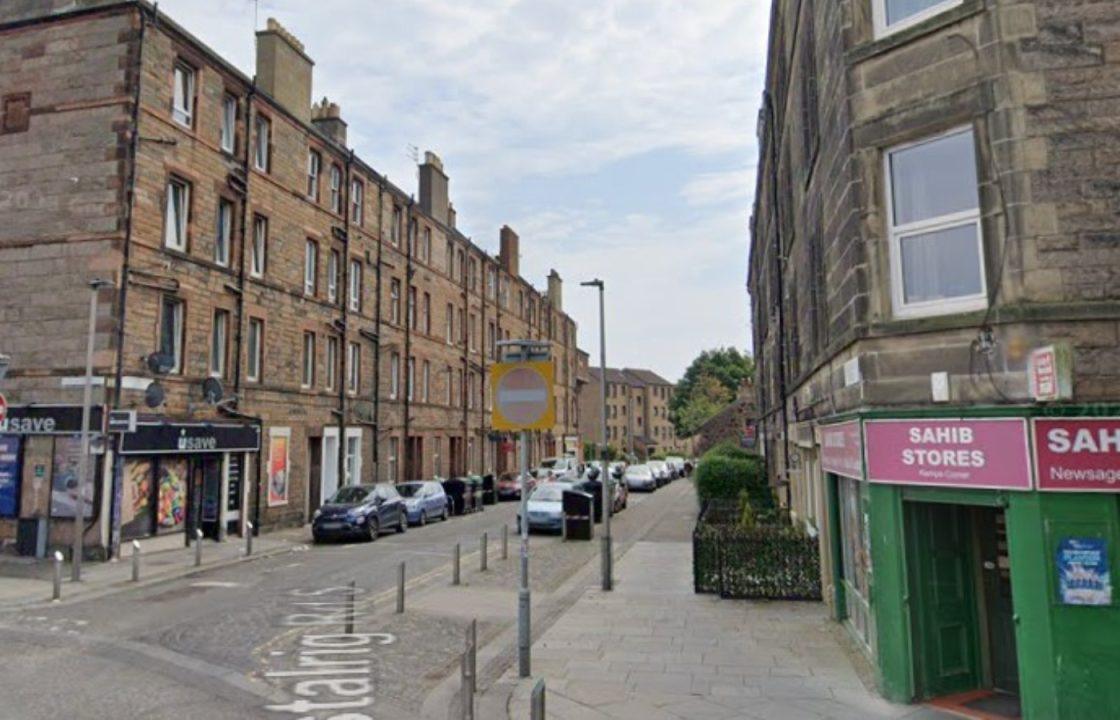 Manhunt after shop robbed and woman threatened with bladed weapon at bus stop in Edinburgh