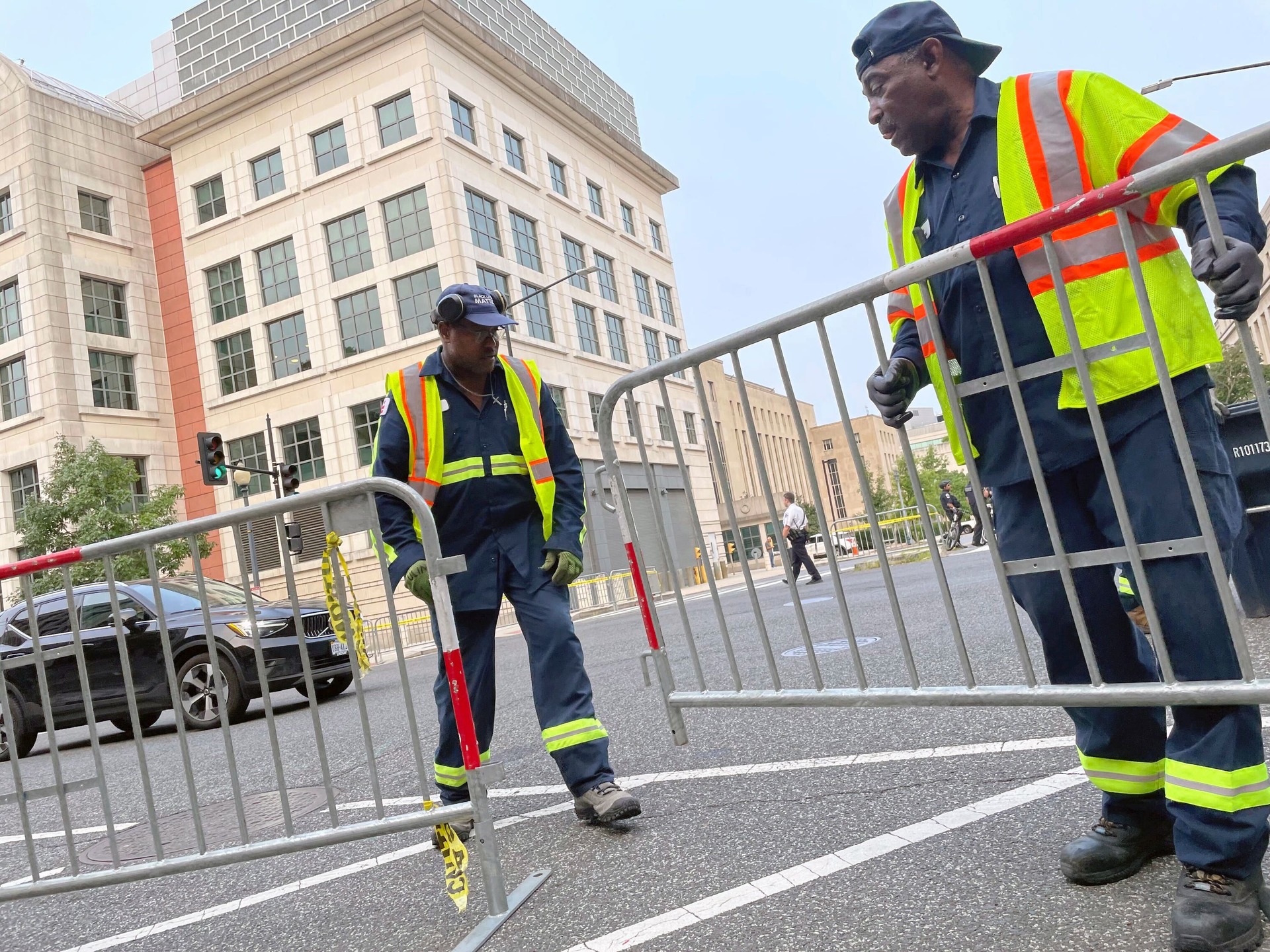 Workers placed barricades around the area of the courthouse ahead of the former president’s arrival.