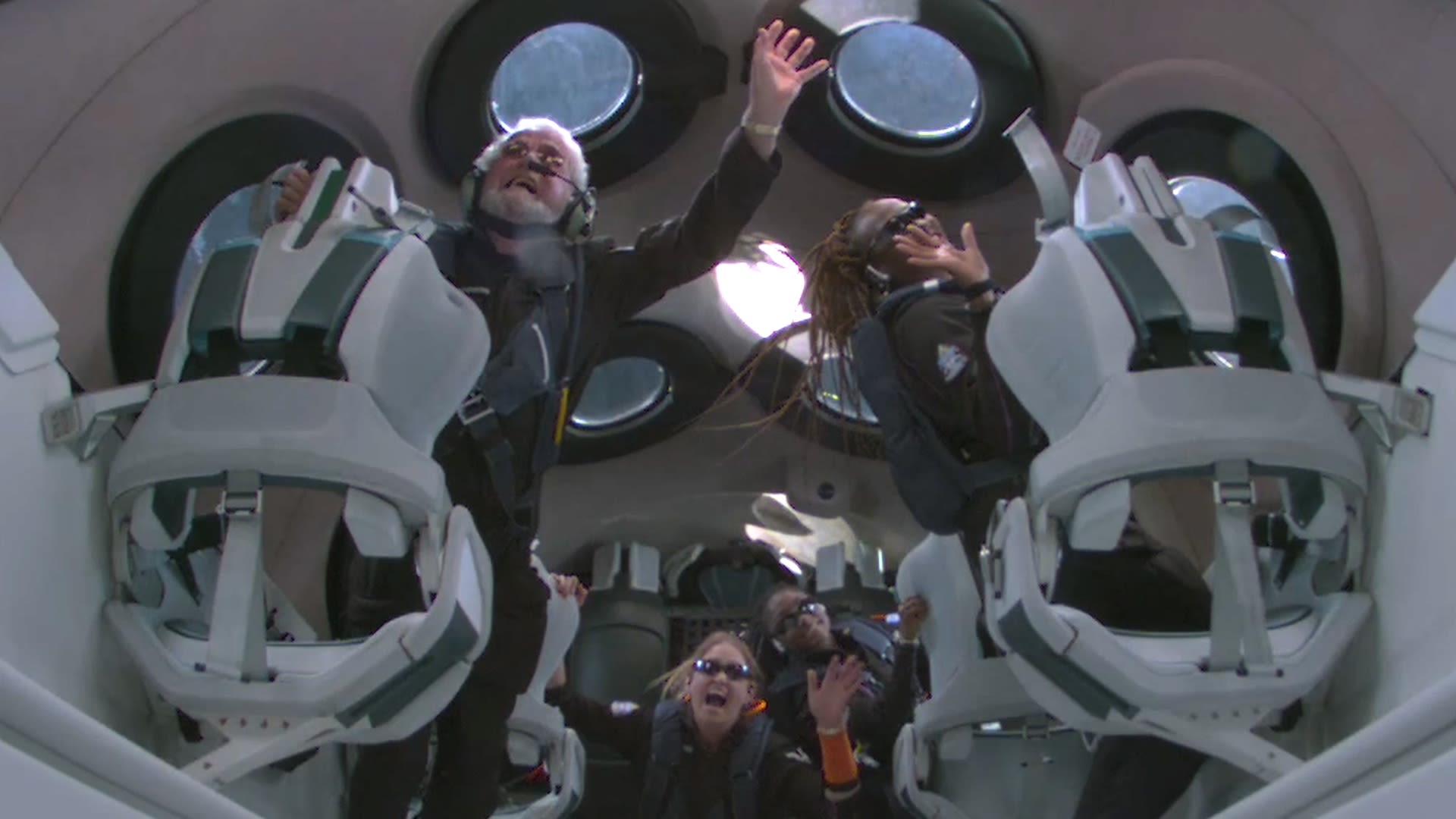 Goodwin (left), Anastatia (centre-right) and Keisha (right) wave from space. 