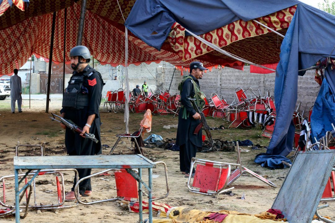 Islamic State claims responsibility for suicide bombing that killed 54 at rally in Pakistan