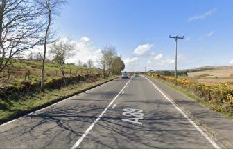 Woman dies after motorbike crashes with car on A89 between Armadale and Westrigg as man arrested