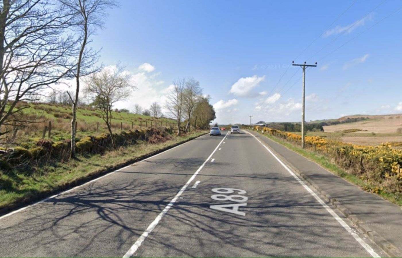 Woman dies after motorbike crashes with car on A89 between