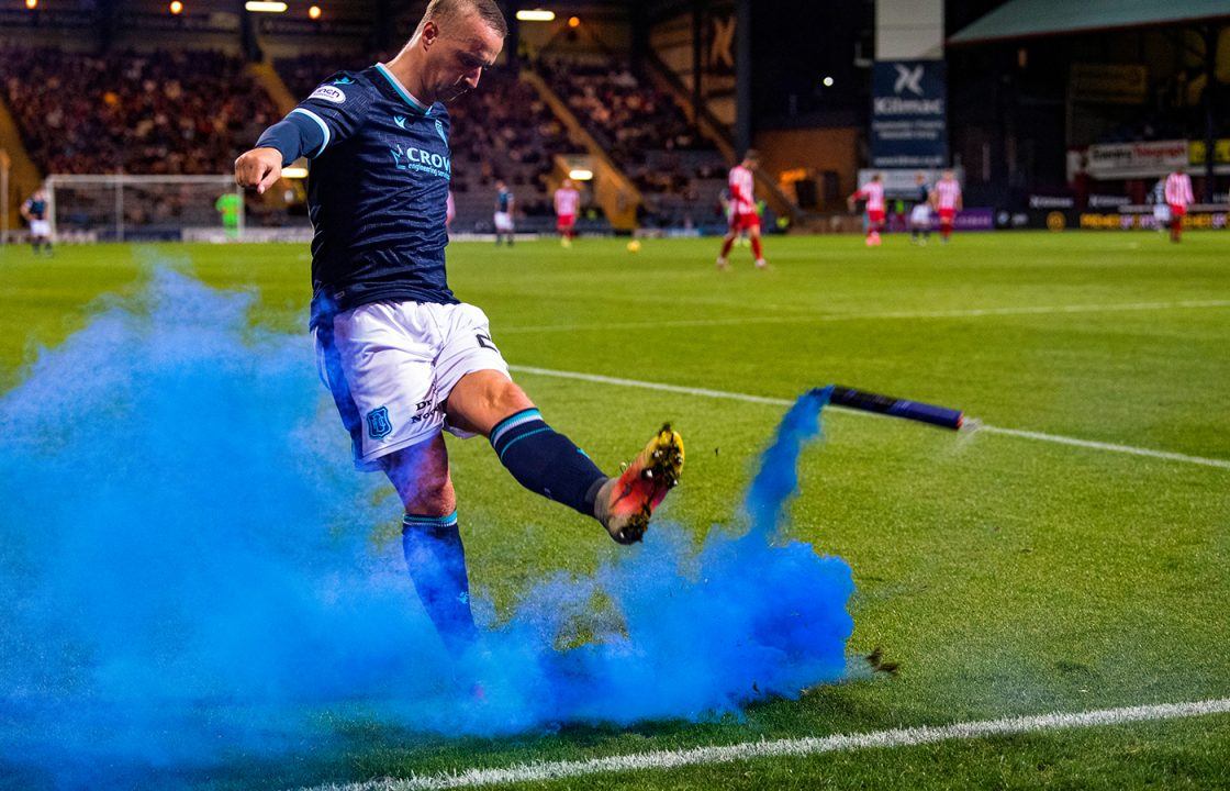 Footballer Leigh Griffiths fined after admitting booting lit flare into St Johnstone crowd during match