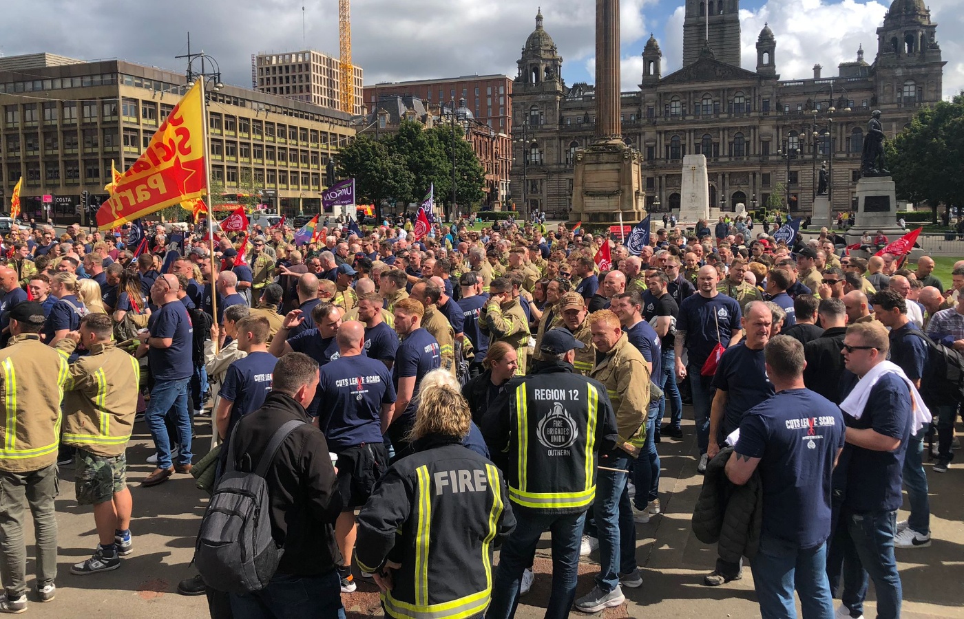 Firefighters gathered to protest in George Square.