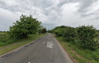 One person airlifted to hospital after crash between motorcycle and car on A6105 near Gordon