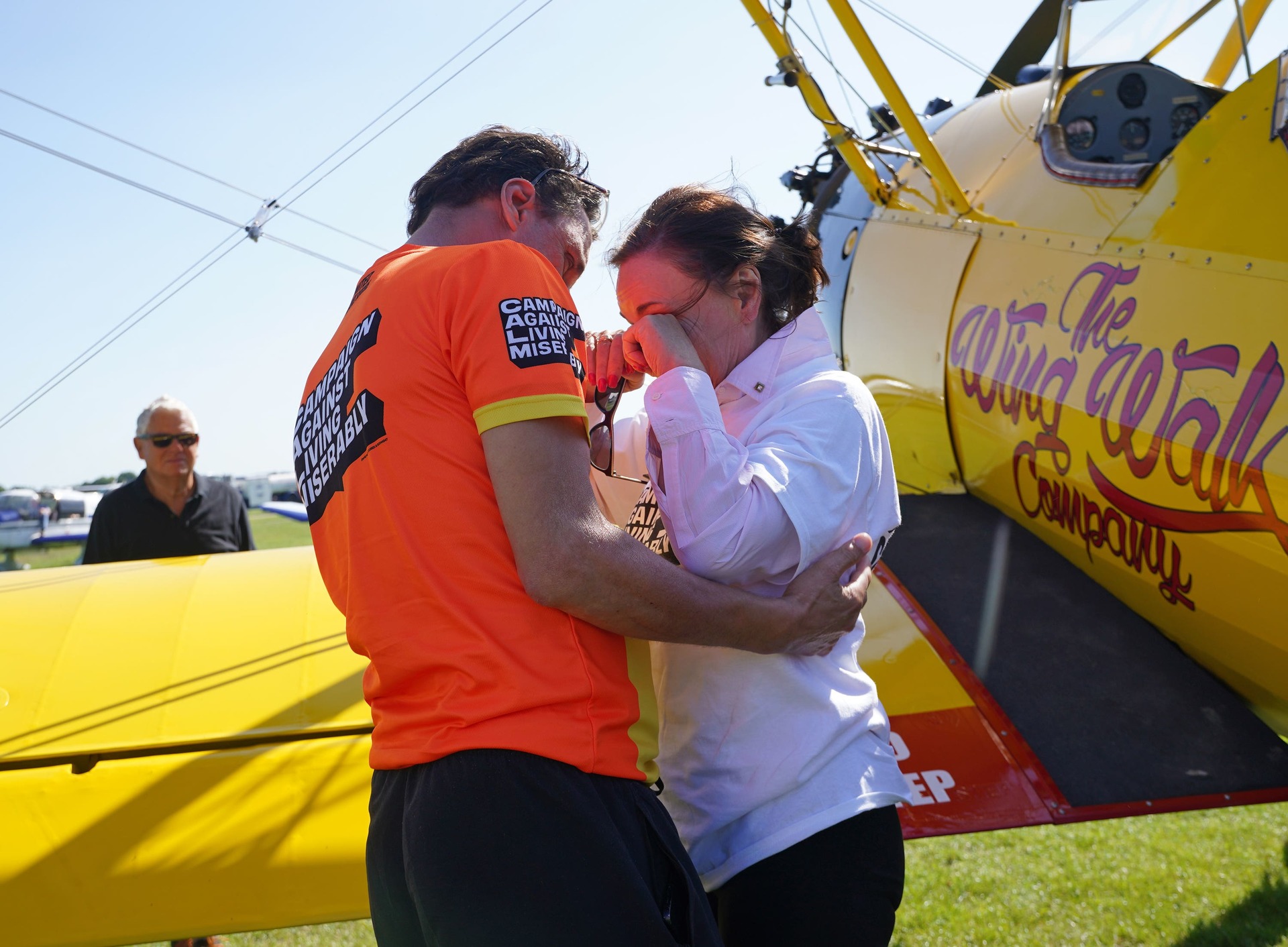 Shirley Ballas embraced by Daniel Taylor after completing her wing walk at 700ft in the Skyathlon challenge.