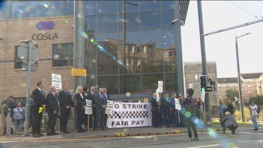 Police and firefighters demonstrate against pay and cuts