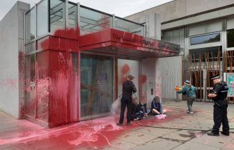 Climate group This is Rigged spray paint Scottish Parliament red after North Sea oil and gas licences announced