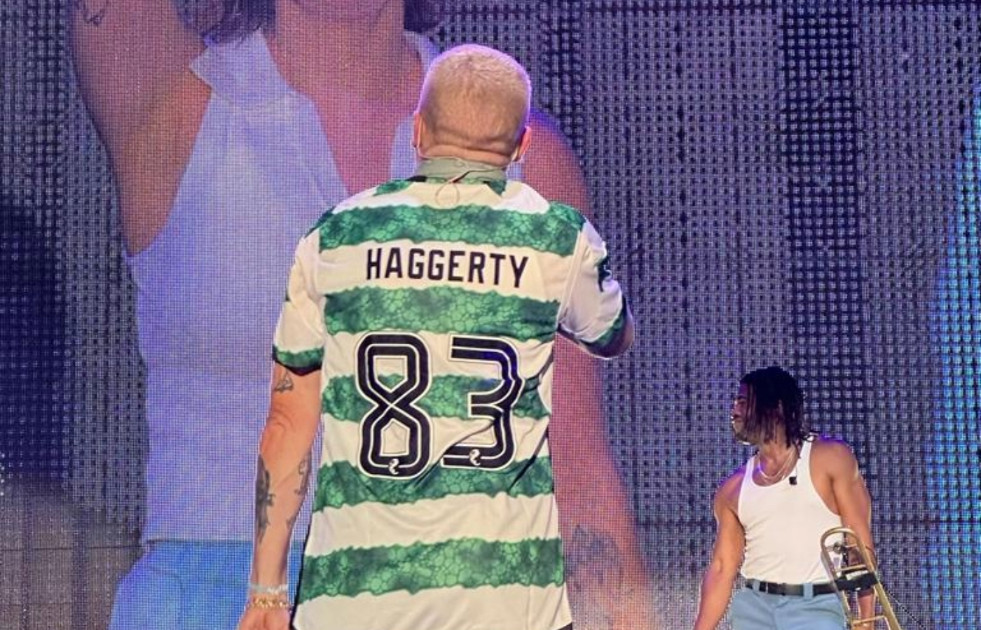 Macklemore performing in a Celtic shirt at New York show.