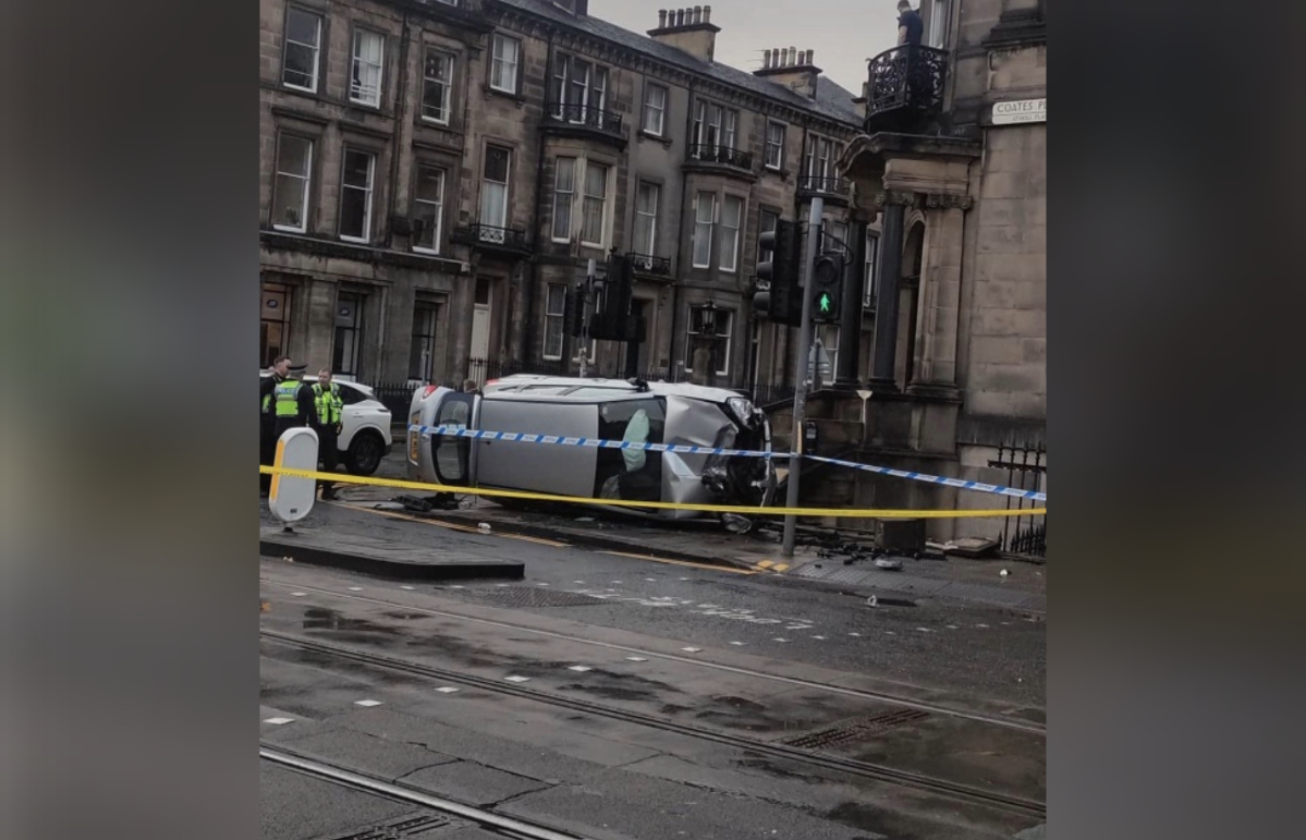 Edinburgh car rolls on to side at Haymarket bend as police rush to