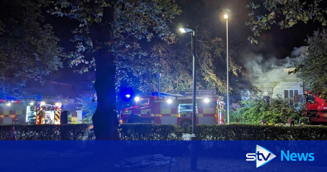 Roof collapses on building as fire crews tackle blaze overnight in ...