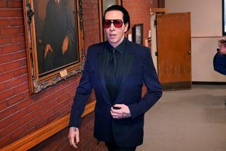 Marilyn Manson fined after pleading no contest to blowing nose on videographer at concert