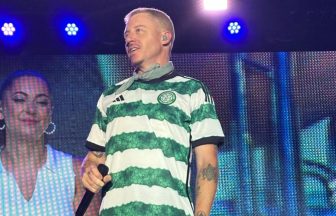 Macklemore wears personalised Celtic football top gifted by Irish fans at New York gig