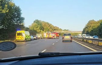 School bus carrying pupils left on its side in ‘major incident’ on M53 motorway