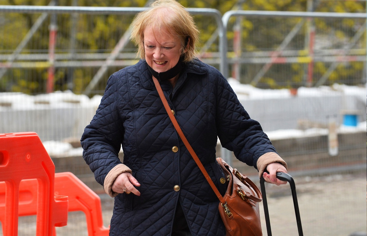 Ann Dunlop, 68, claimed a woman she knew was being lined up for million pound contracts.