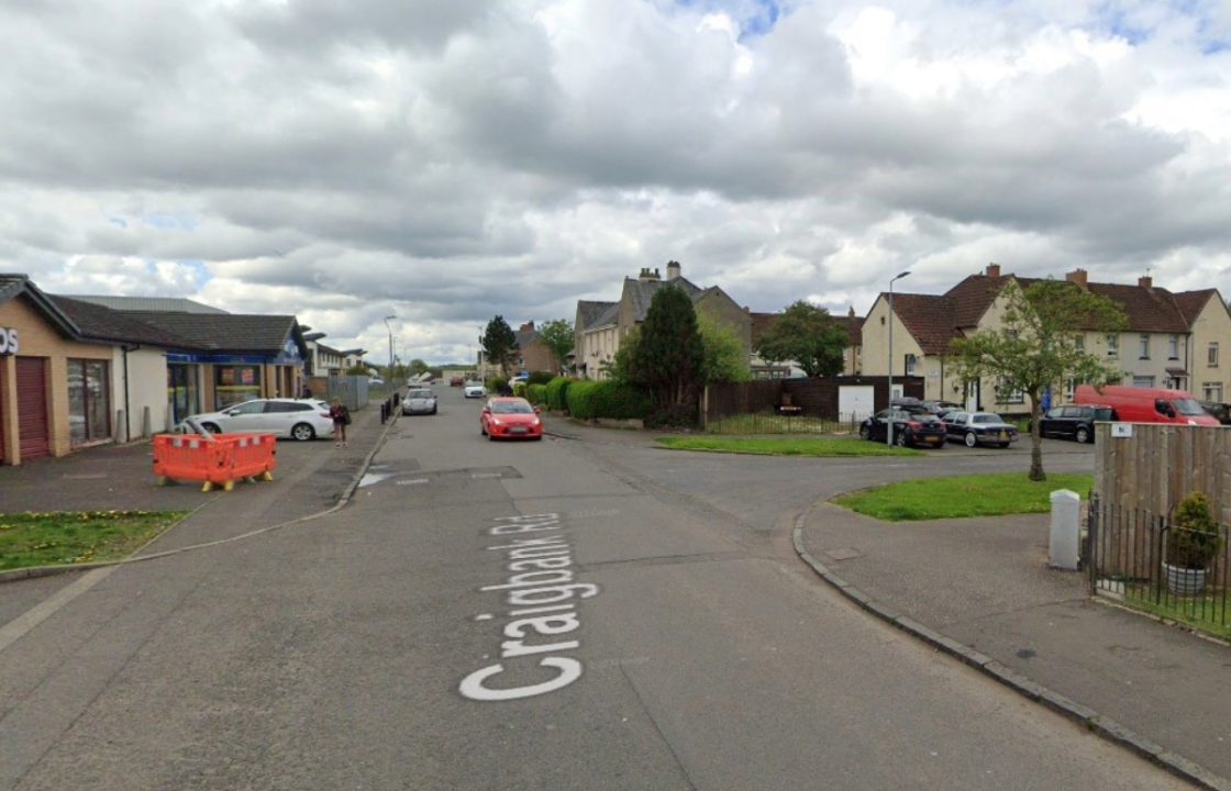 Woman rushed to hospital after assault and robbery in Larkhall