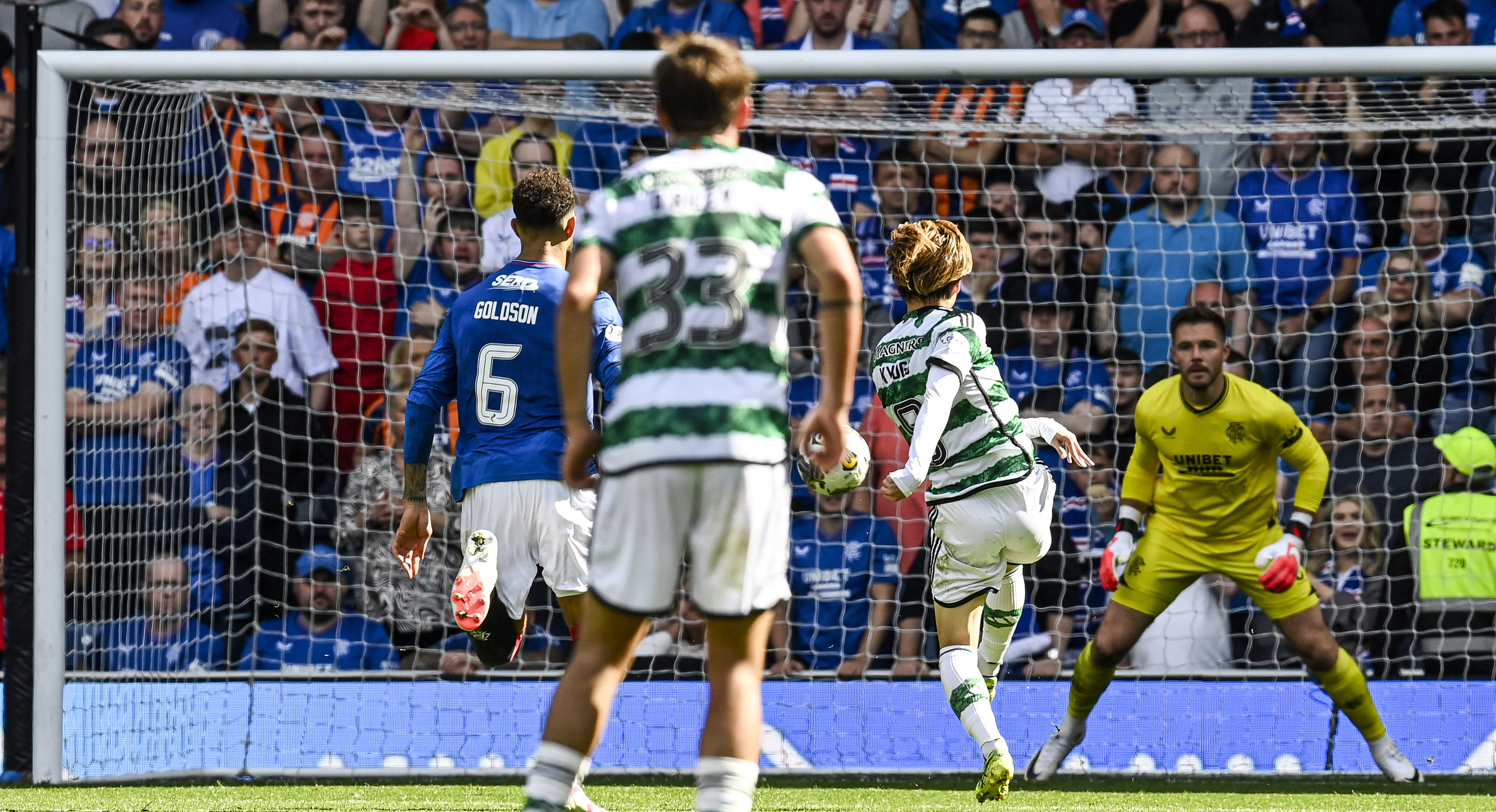 Celtic's Kyogo Furuhashi scores to make it 1-0 during a cinch Premiership match between Rangers and Celtic at Ibrox Stadium, on September 3, 2023.
