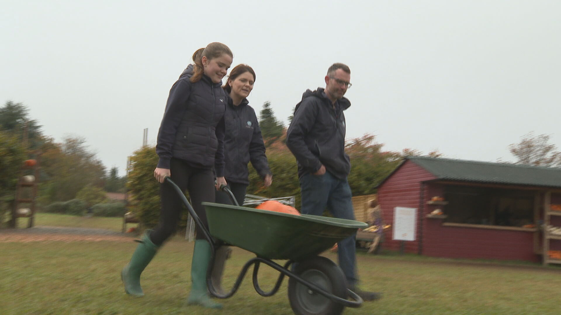 Louisa with her mum, Lucy and dad, Russell, collecting pumpkins at Kilduff Farm for the kids. 