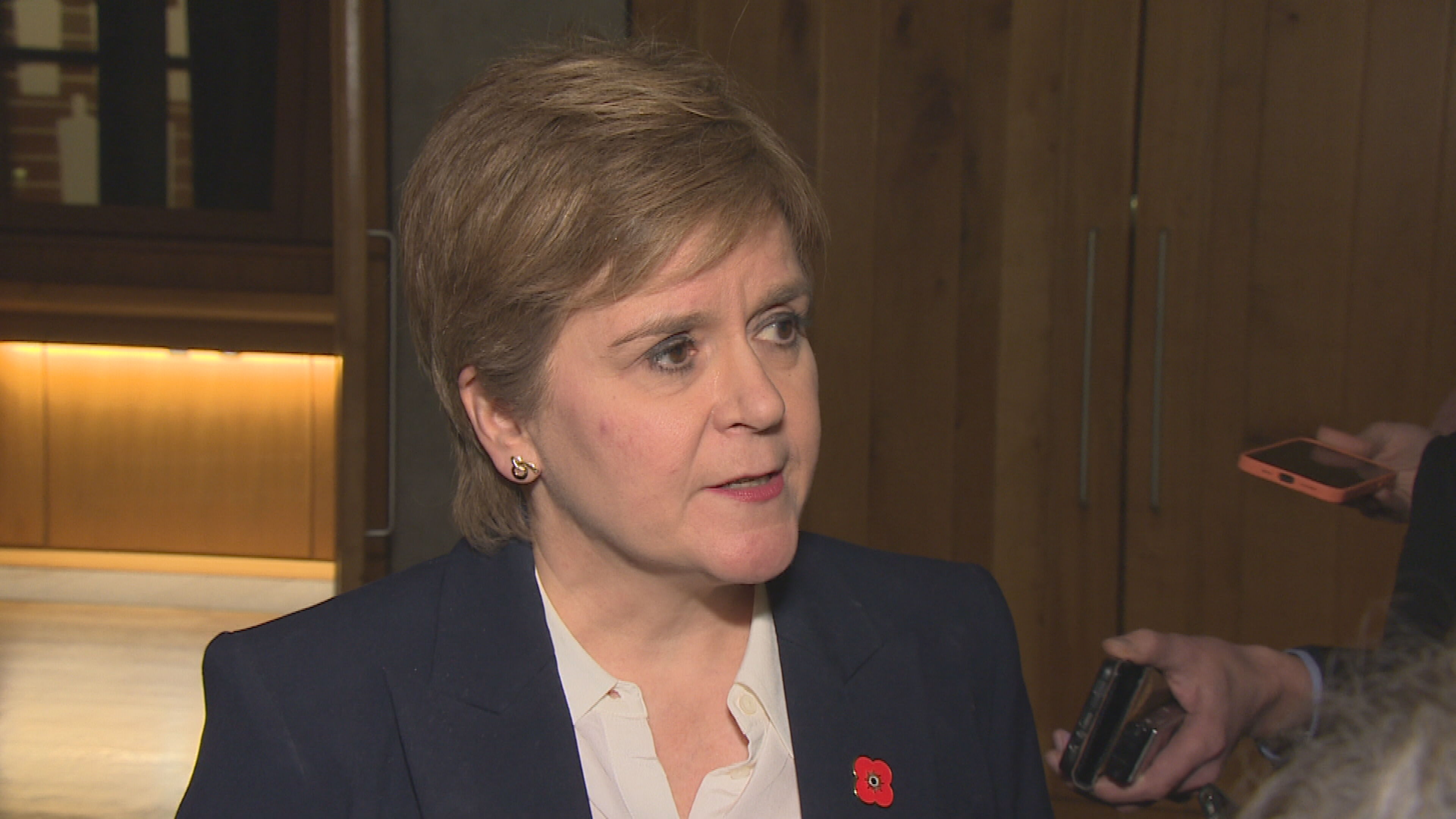 The former First Minister said she 'handled' messages in line with policy at the time.