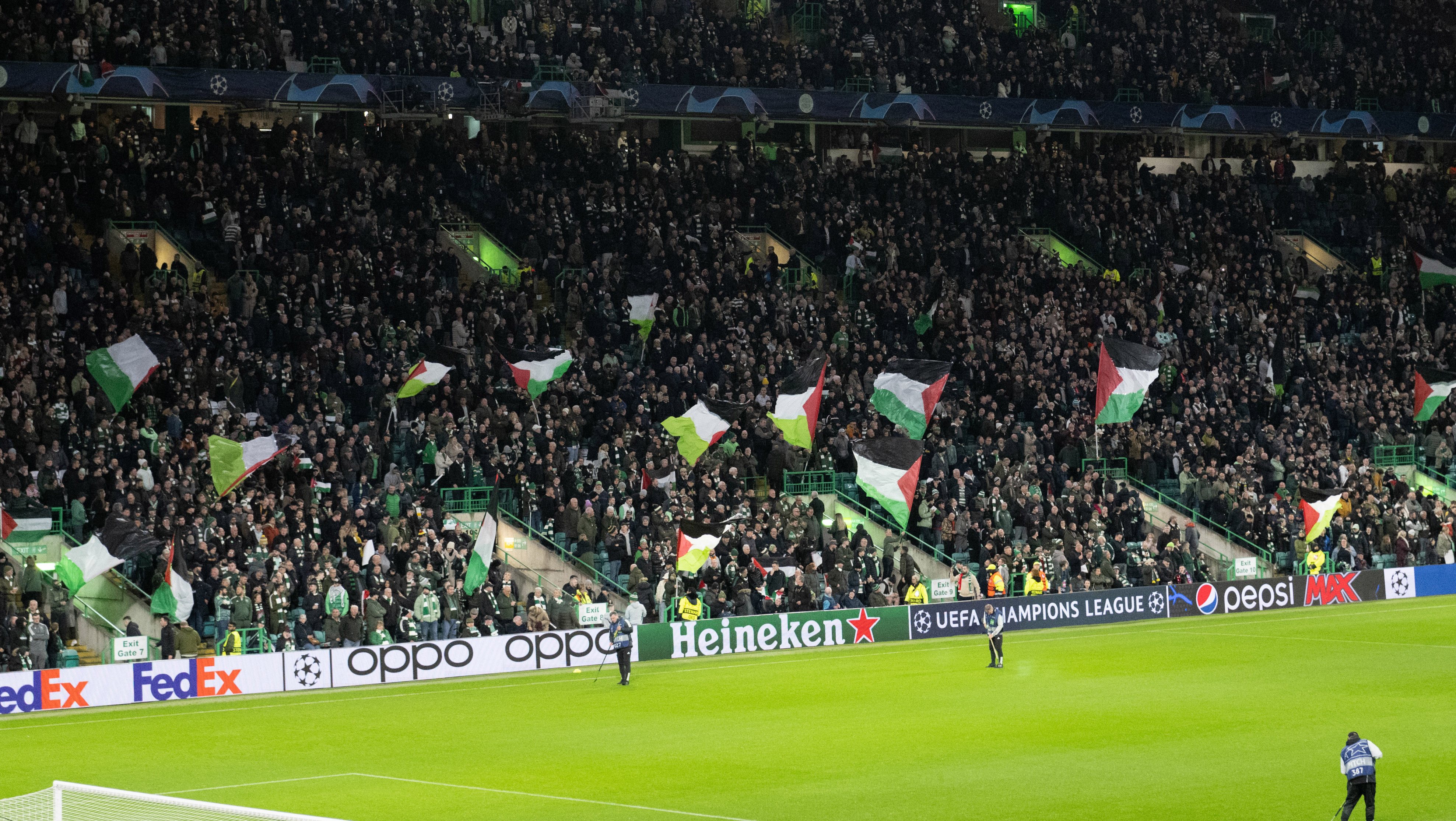 GLASGOW, SCOTLAND - OCTOBER 25: A general view of Celtic Park as the fans hold up Palestine flags during a UEFA Champions League match between Celtic and Atletico de Madrid at Celtic Park, on October 25, 2023, in Glasgow, Scotland. (Photo by Paul Devlin / SNS Group)