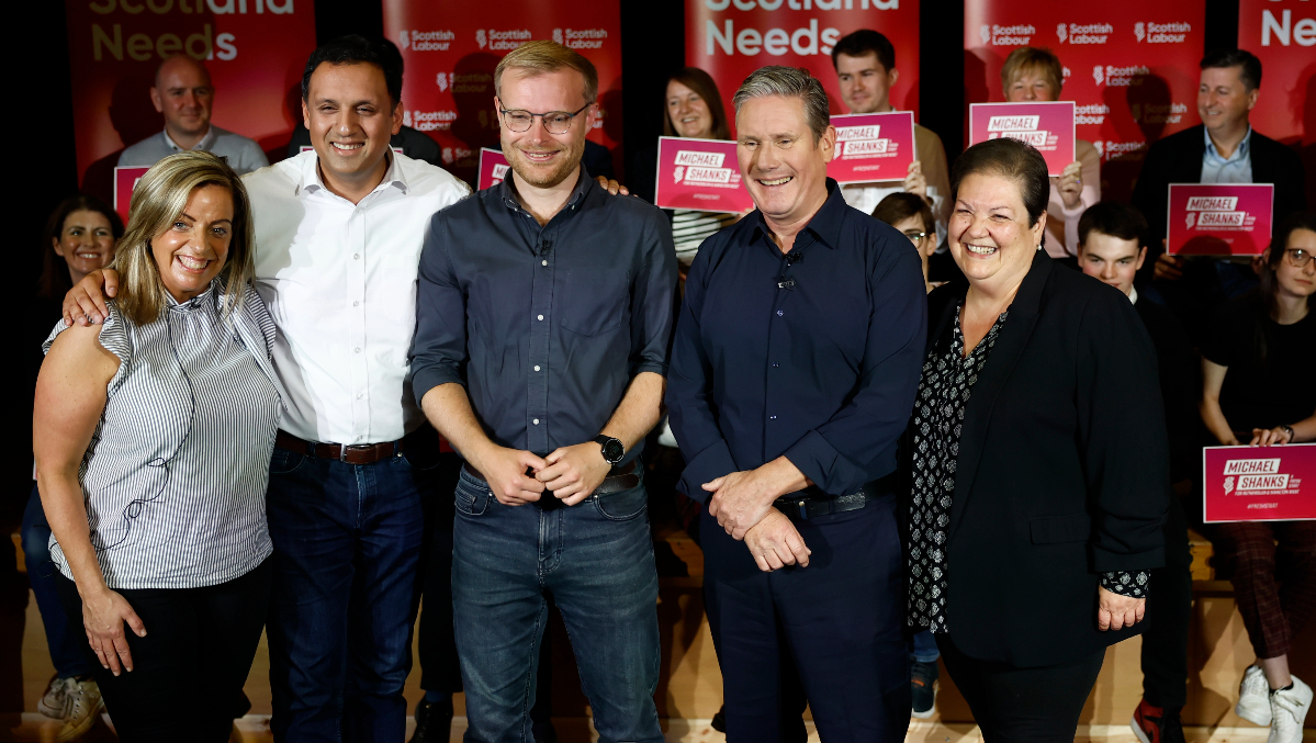 Labour leader Sir Keir Starmer (2nd, R), Leader of the Scottish Labour Party Anas Sarwar (2nd, L) attend a campaign event with Scottish Labour’s candidate for the Rutherglen and Hamilton West by-election Michael Shanks (C) on September 29, 2023 in Hamilton.