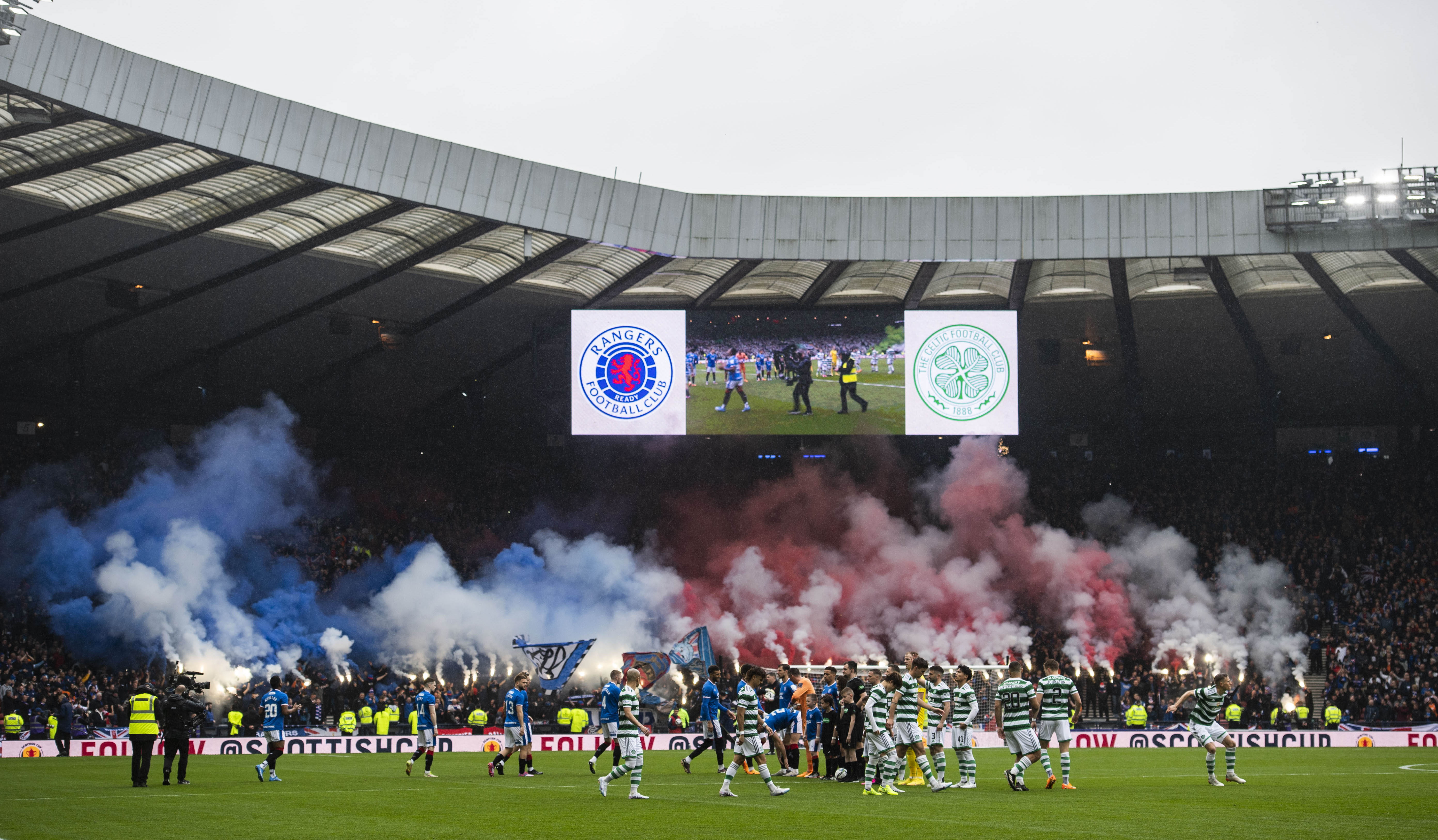 The teams emerge onto the pitch during a Scottish Cup semi-final match between Rangers and Celtic at Hampden Park, on April 30, 2023.