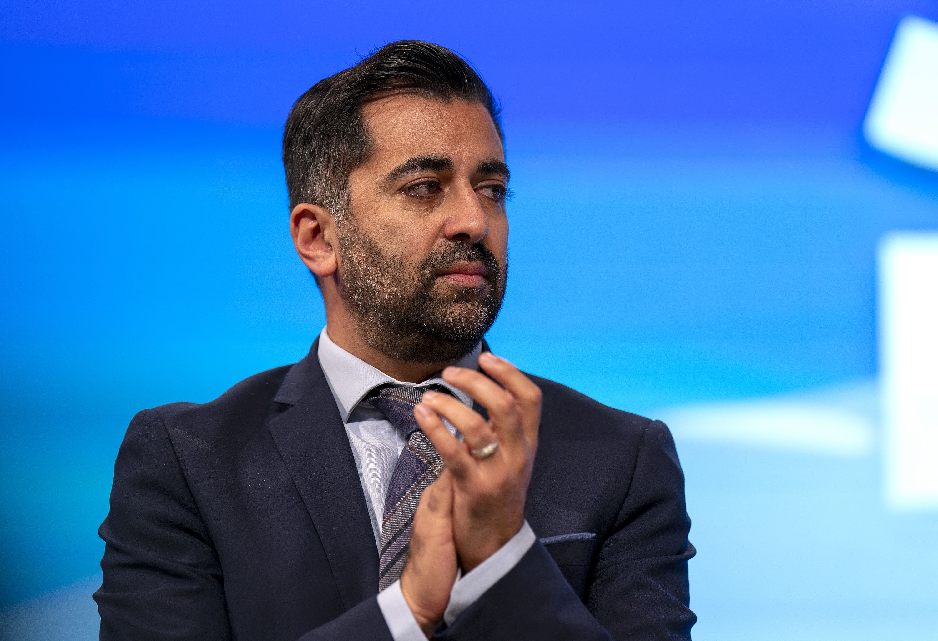 First Minister Humza Yousaf applauds his wife Nadia El-Nakla after she addressed the situation in Gaza during the SNP conference