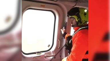 Flooding and landslides with ten rescued by Coastguard helicopter amid amber rain warning across Scotland