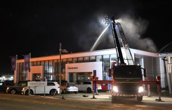 Firefighters tackle blaze at car dealership overnight in Perth