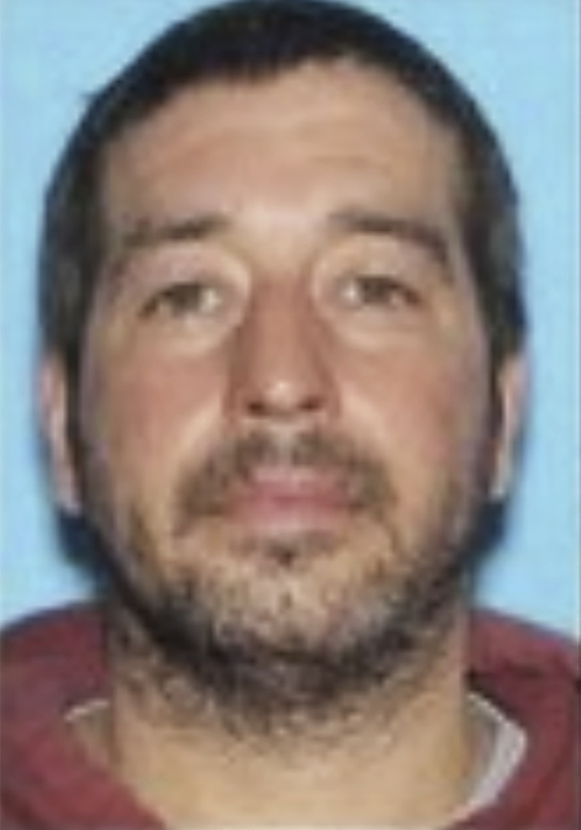 This photo released by the Lewiston Maine Police Department shows Robert Card, who police have identified as a person of interest in connection to mass shootings in Lewiston, Maine, on Wednesday.