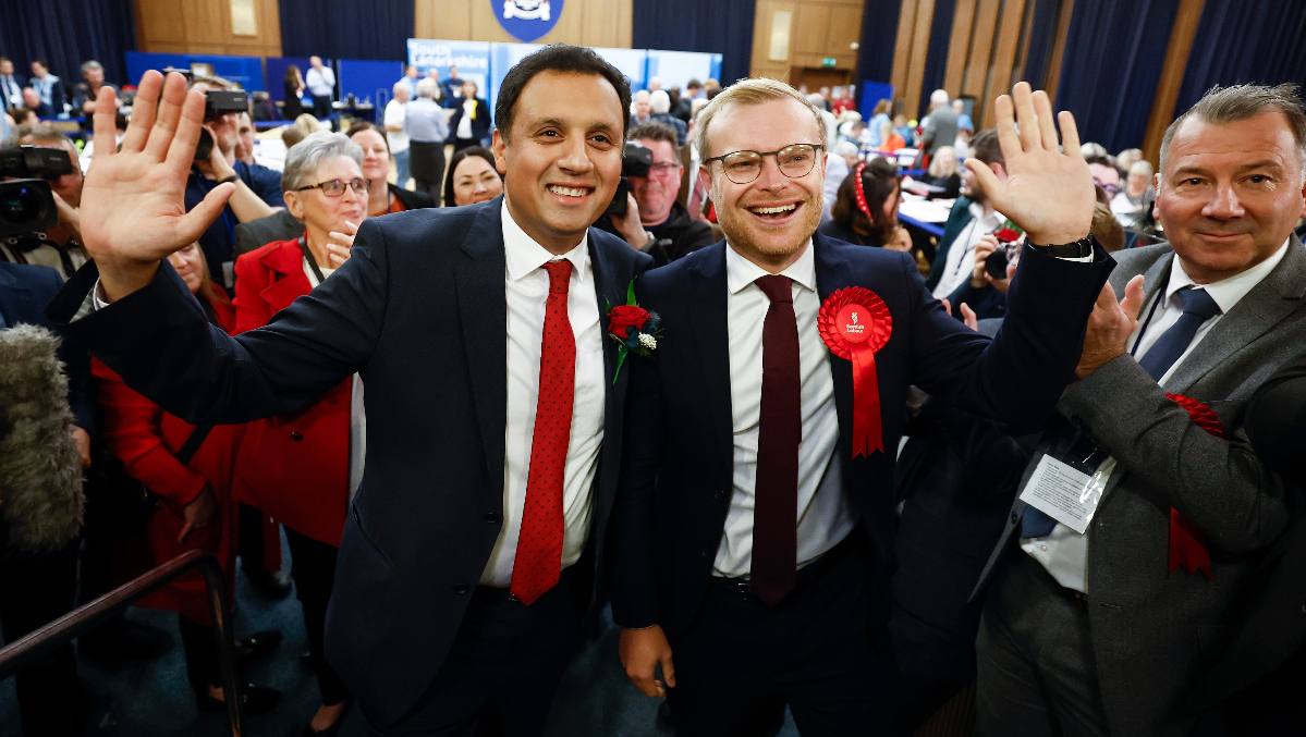 Scottish Labour candidate Michael Shanks (R) and Scottish Labour Leader Anas Sarwar arrive at the Rutherglen and Hamilton West by-election count.