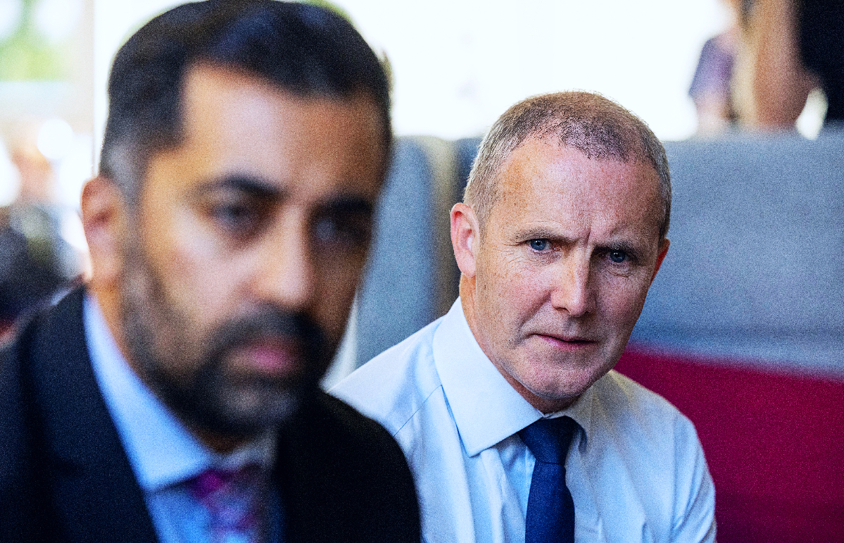 Scotland's First Minister Humza Yousaf (L) and health secretary Michael Matheson.