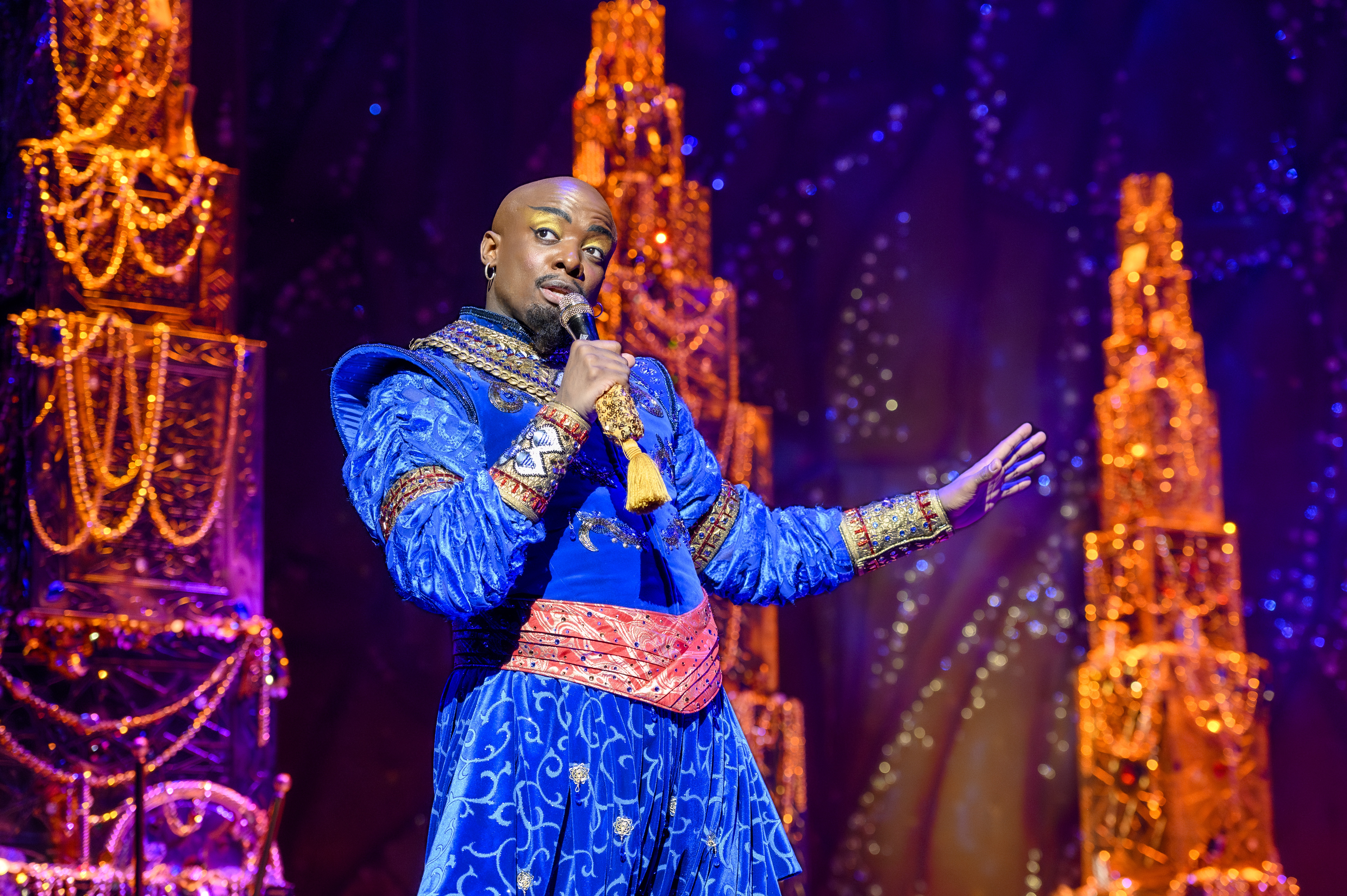 Yeukayi Ushe (Genie) on stage during the production of Disney's Aladdin.