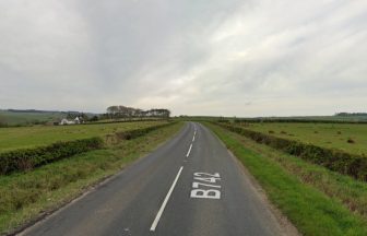 Car passenger fighting for his life and man arrested following car crash on B742 in South Ayrshire