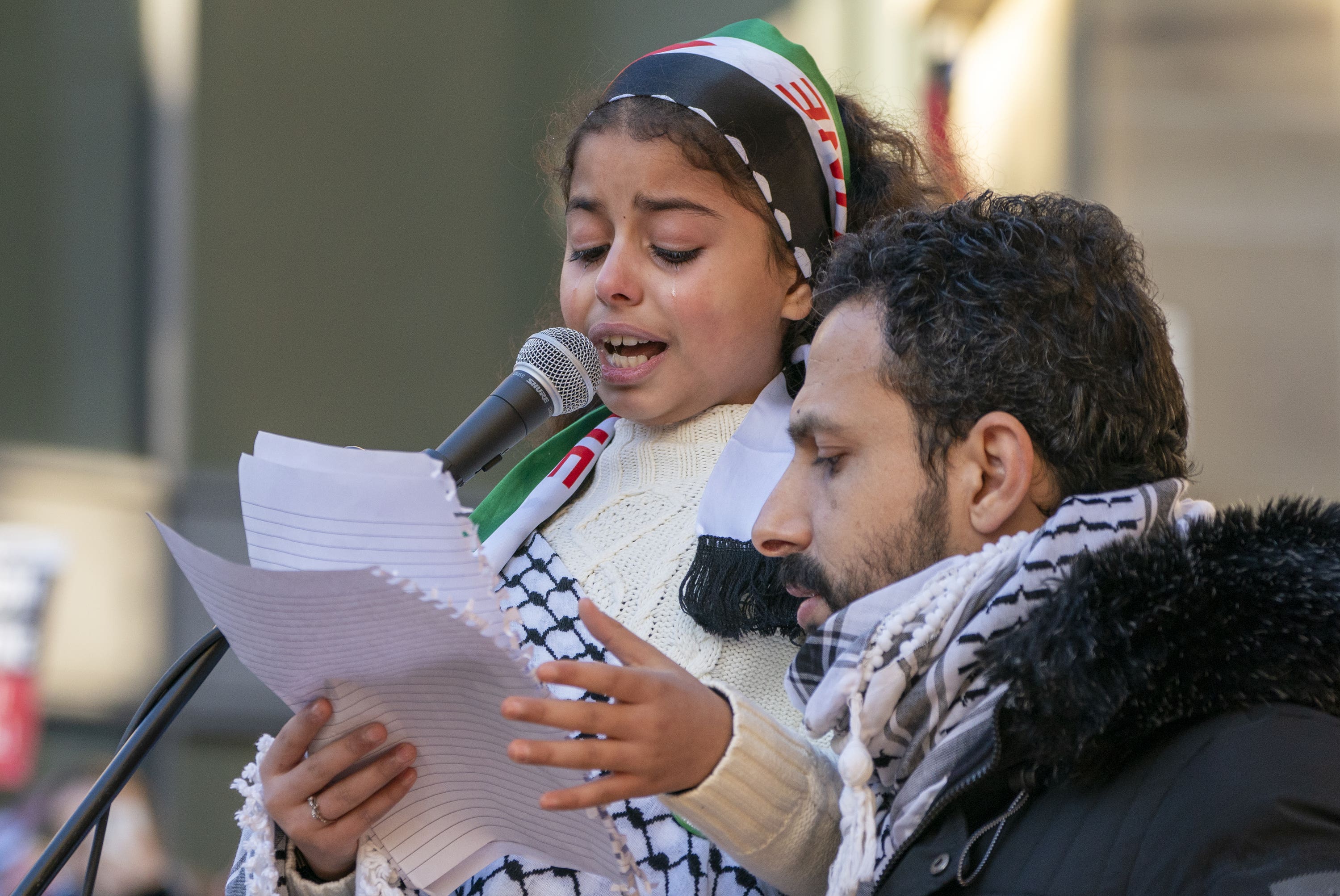 Jeewan Wadi, from Gaza, speaks at a Scottish Palestine Solidarity Campaign demonstration in Glasgow.